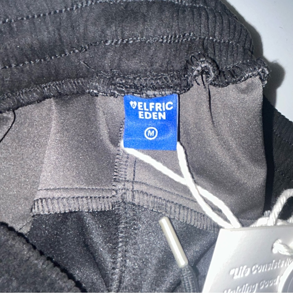 AELFRIC EDEN REFLECTIVE STRIP
TRACK PANTS Size M NWT‎ - Picture 8 of 9